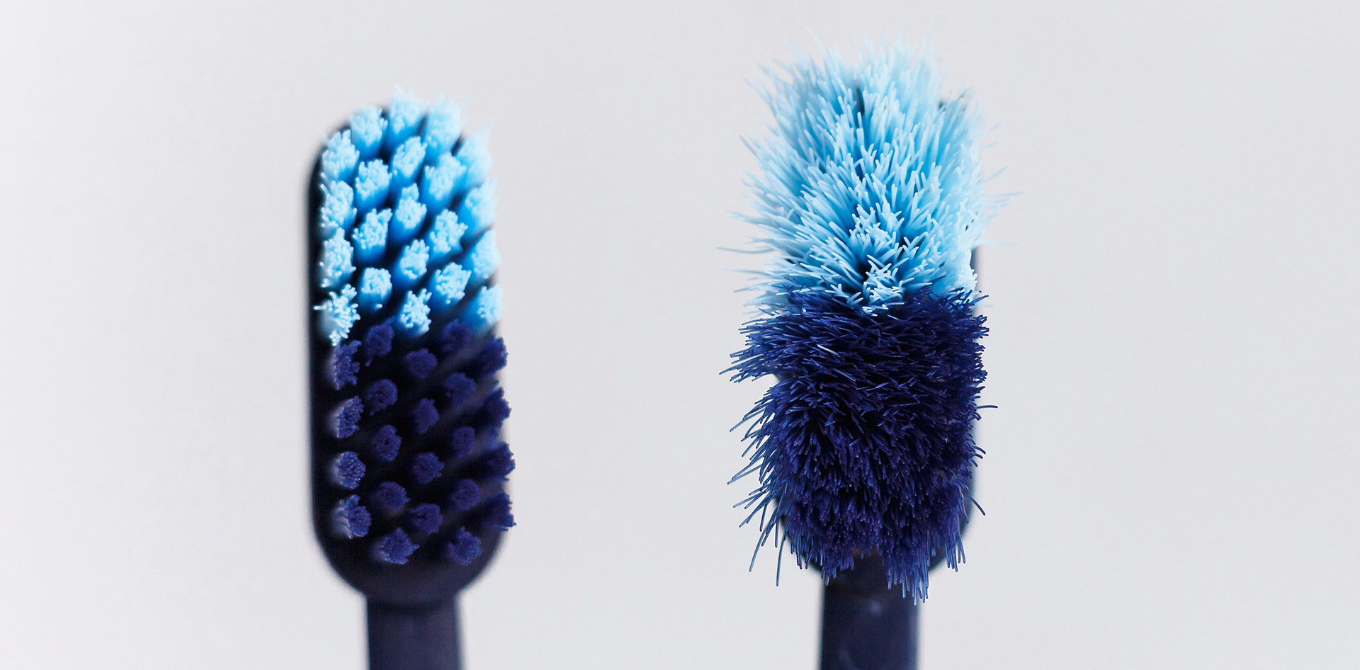 A regular and frayed toothbrush